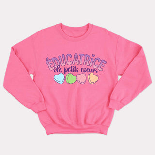 ÉDUCATRICE DE PETITS COEURS crewneck unisexe